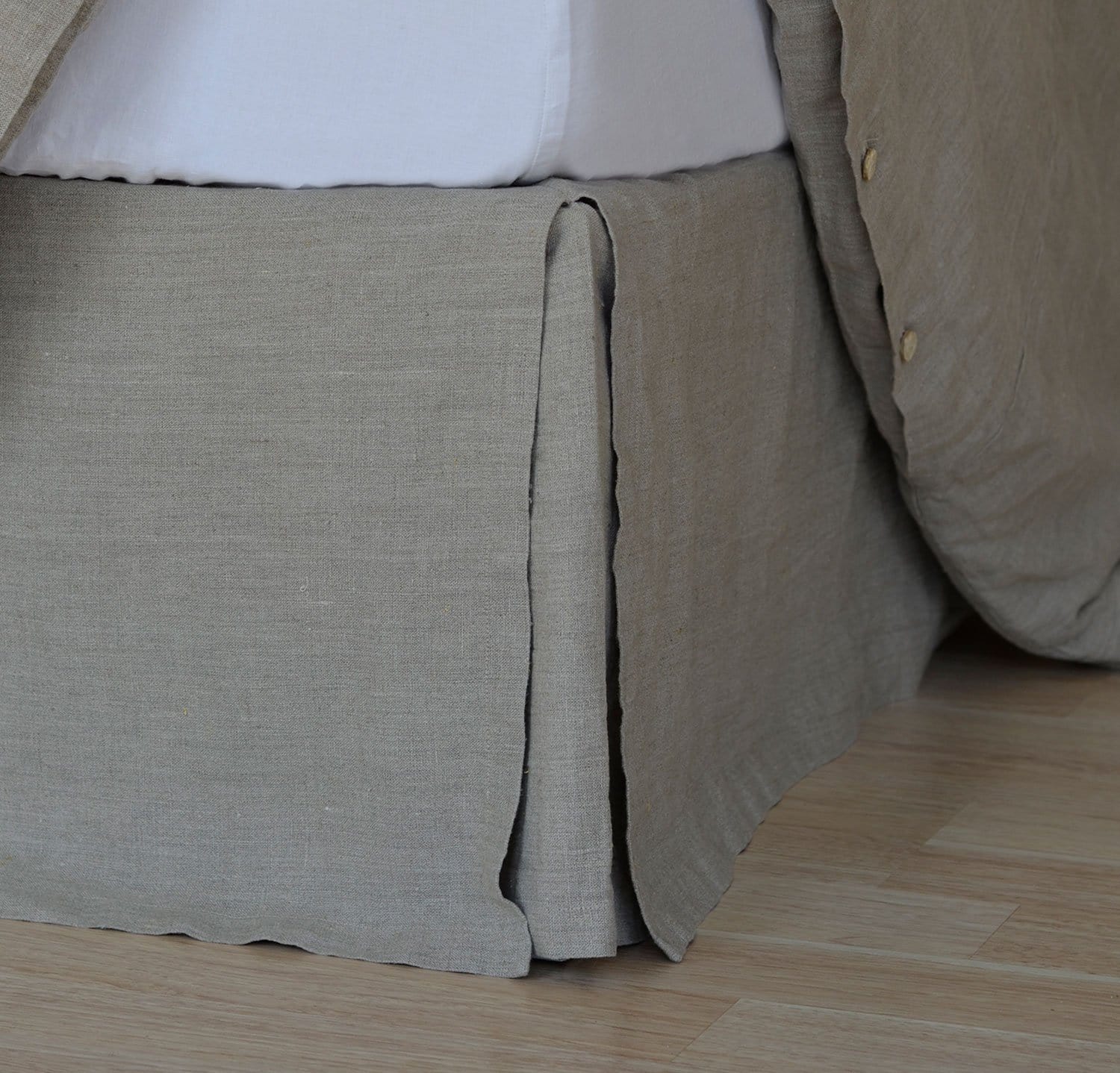 bed detail of 100% linen bedskirt heavyweight Orkney linen fabric natural light brown beige tan color