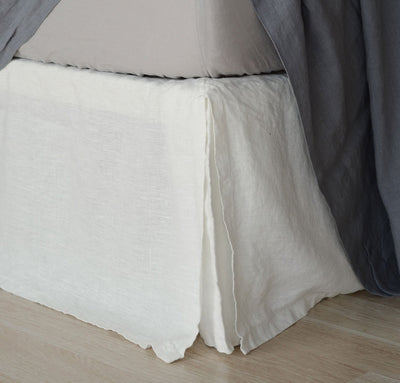 bed detail of 100% linen bedskirt heavyweight Orkney linen fabric off-white white color