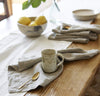 dining table scene with 100% linen napkins heavyweight Orkney linen fabric natural light brown beige tan color