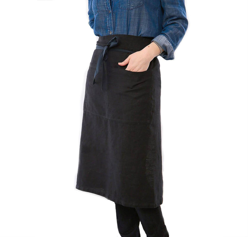 man wearing 100% linen apron heavyweight Orkney linen fabric charcoal dark grey color