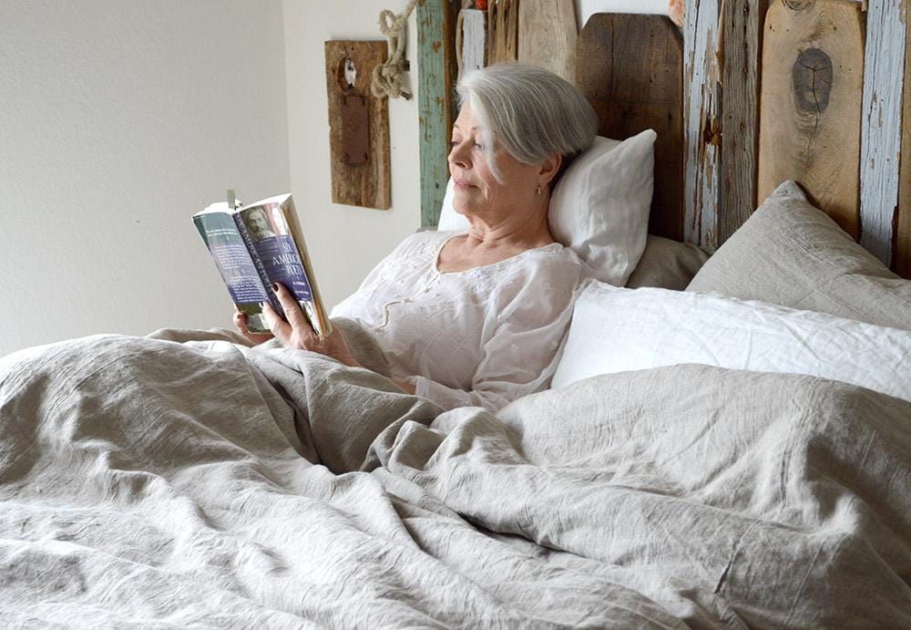 Tricia - Rough Linen Founder Reading a Book