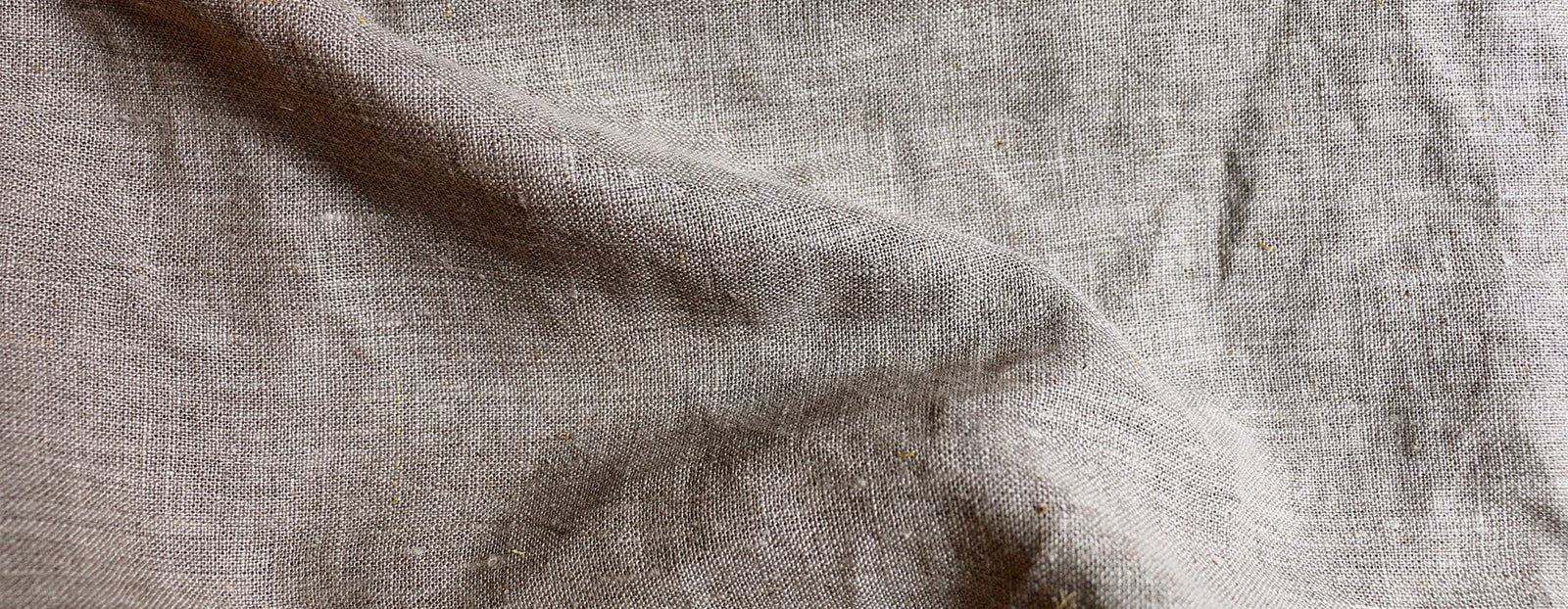 A swatch of Orkney linen fabric in a natural color.