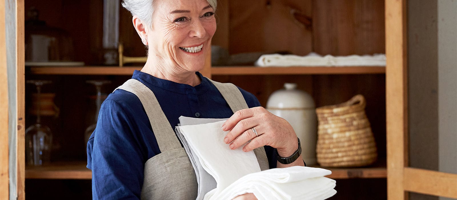 Tricia of Rough Linen holding a white cloth