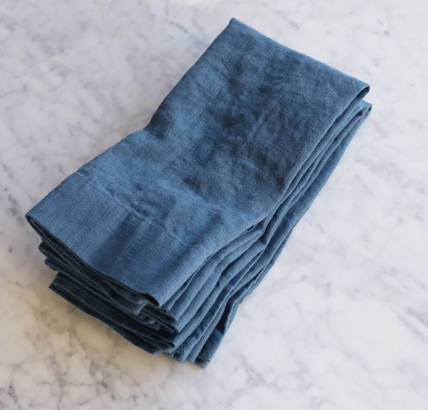 https://www.roughlinen.com/cdn/shop/products/Orkney-linen-napkins-set-of-four-vintage-blue_2000x.jpg?v=1695403535