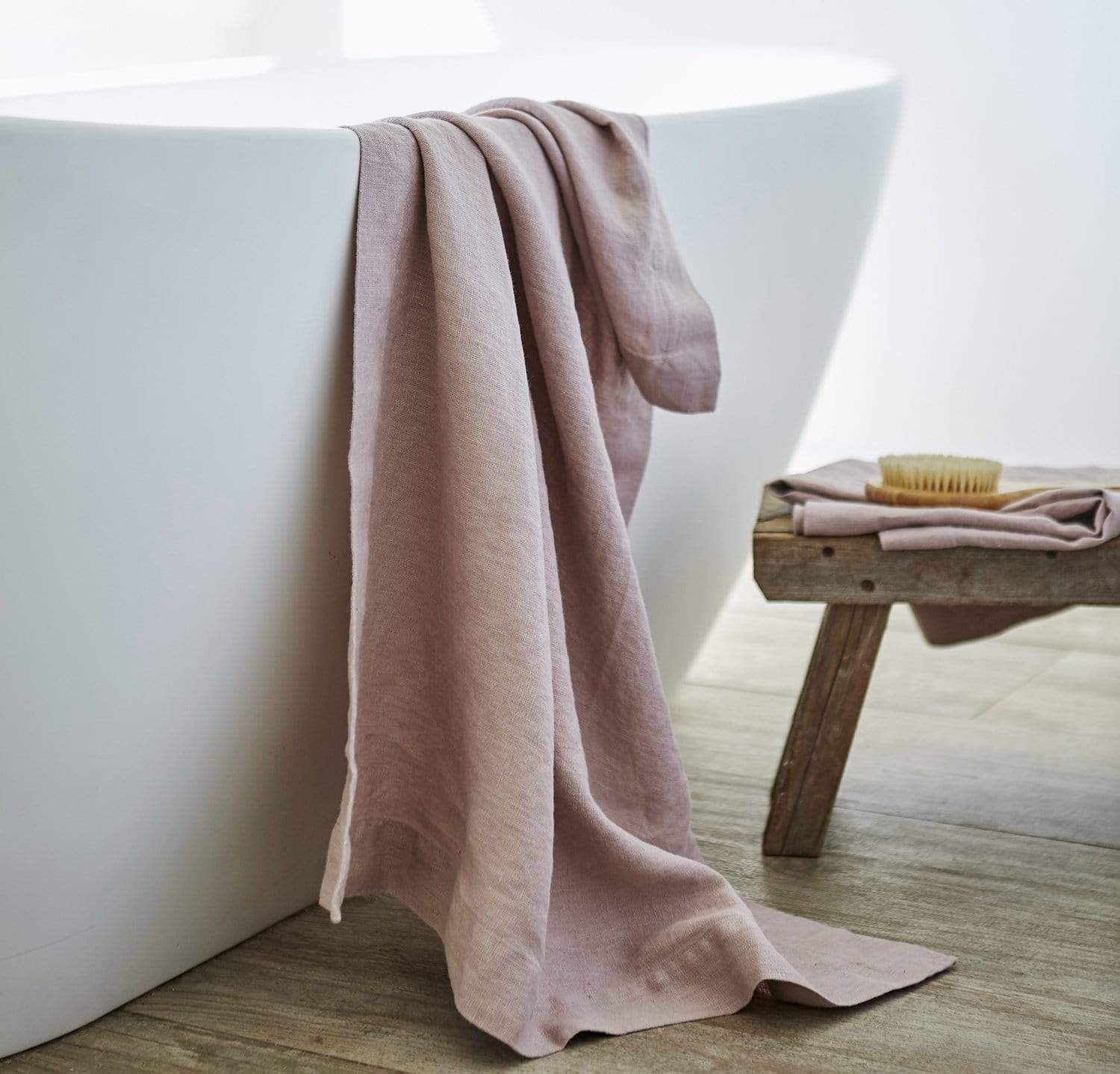 bathtub with 100% linen bath sheet heavyweight Orkney linen fabric sturdy antimicrobial large bath towel rose light pink color