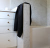 bathroom scene with100% linen bath towel sturdy antimicrobial fast drying heavyweight Orkney linen fabric black color