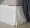 bed detail of 100% linen bedskirt heavyweight Orkney linen fabric off-white white color
