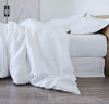 bedroom scene with 100% linen bed duvet comforter cover smooth texture lightweight linen fabric pure white color
