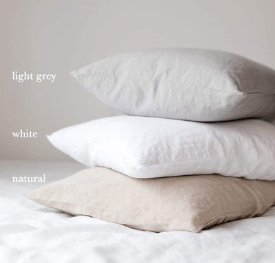 stack of 100% linen pillow slip covers natural beige light brown tan pure white light grey colors