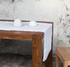 table with 100% linen table runner raw edge detail pure white color